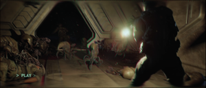 UNSC Marine Manuel Mendoza runs away while Jacob Keyes is attacked by Flood pod infectors in the Installation 04 Flood containment facility, as seen in Wallace Jenkins' helmet recording. Screenshot taken from Halo: Campaign Evolved campaign level 343 Guilty Spark.