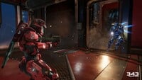 Two Spartans fighting each other, with one using their thruster.