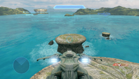 A G79 Pelican being flown on Forge Island in Halo: The Master Chief Collection.