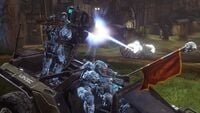 Three Spartans delivering a flag in a Warthog in Halo 4.