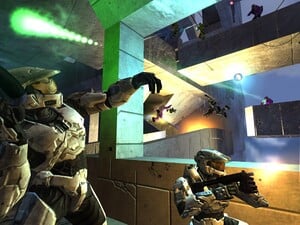 Promotional image for Halo 2 featuring a Mark VI-clad Spartans fighting on the multiplayer map Lockout.
