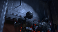 The player's Spartan and Dinh opening the door together.