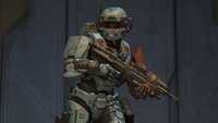 A Spartan-IV wearing a Linebreaker helmet with the HUL[5X]/BNR/ECHELON attachment on Catalyst.