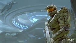 A screenshot of John-117 in front of the Gateway on the level Reunion.