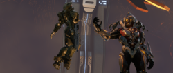 The Ur-Didact holding John-117 in a constraint field.
