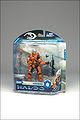 The orange Spartan Hayabusa figure in package.