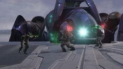 Marcus Stacker and Banks fire their Type-25 plasma pistols at two Jiralhanae Captains at the Bastion of the Brutes in Halo 2: Anniversary campaign level The Great Journey.