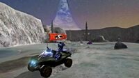 The Flag carrier on a Warthog while being pursued by Ghosts in Halo: Combat Evolved.