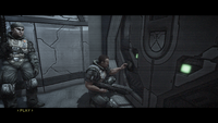 Bisenti (left) waiting for a fellow marine to unlock a door in Halo: Combat Evolved Anniversary.