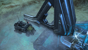 An XRP12 Gremlin firing its X23 Non-Nuclear Electromagnetic Pulse Cannon at a Forerunner pylon on Halo Wars campaign level Shield World.