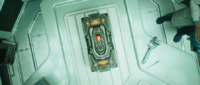 Overhead view of the "Didact's Gift" in an examination room aboard the Infinity.