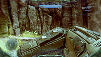 First-person view of John-117 doing a melee attack with the Scattershot.