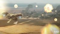 A Hornet flying towards a city in Halo: Spartan Strike.