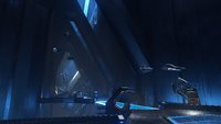 Aggressors in a subterranean Forerunner facility in Halo Infinite.