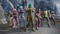 Various multiplayer Spartans in Halo Infinite, with a Flanker-clad player mid-left.