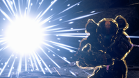 A member of Switchback shielding them self from a Plasma Grenade explosion.