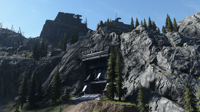 Outpost Tremonius tunnel entrance from base exterior. From Halo Infinite campaign open world.