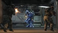 Two Army troopers firing upon a Sangheili Officer as he is assassinated by SPARTAN-B312.