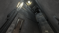 The doll's location can be seen above the stairwell. It can be viewed easier if using Forge to spawn a light.