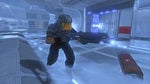 The unknown officer running through the Data Center's frozen level.