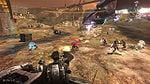 Johnson fights a Covenant assault with a destroyed Chopper in the background.