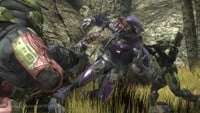 Two Spartans defeat a Sangheili.