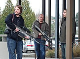 Bungie employees "hunting cougars" outside the studio building with WETA-made replica weapons.
