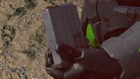 A Spartan-IV reloading a magazine of 7.62x51mm NATO into the MA40 assault rifle in Halo Infinite.