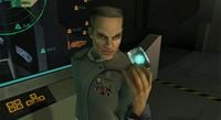 Captain Jacob Keyes holding a data crystal chip in Halo: Combat Evolved.
