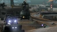 A Sangheili Ranger firing a needle rifle at a Warthog in Halo: Reach.